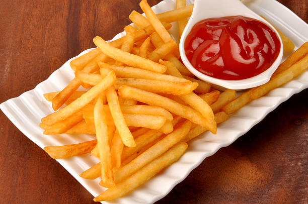 A delicious, spicy French Fries served with 	Tomato Ketchup in beautiful dish